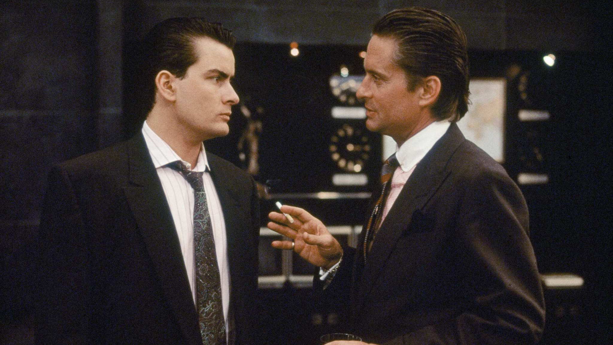 Michael Douglas speaking to Charlie Sheen.