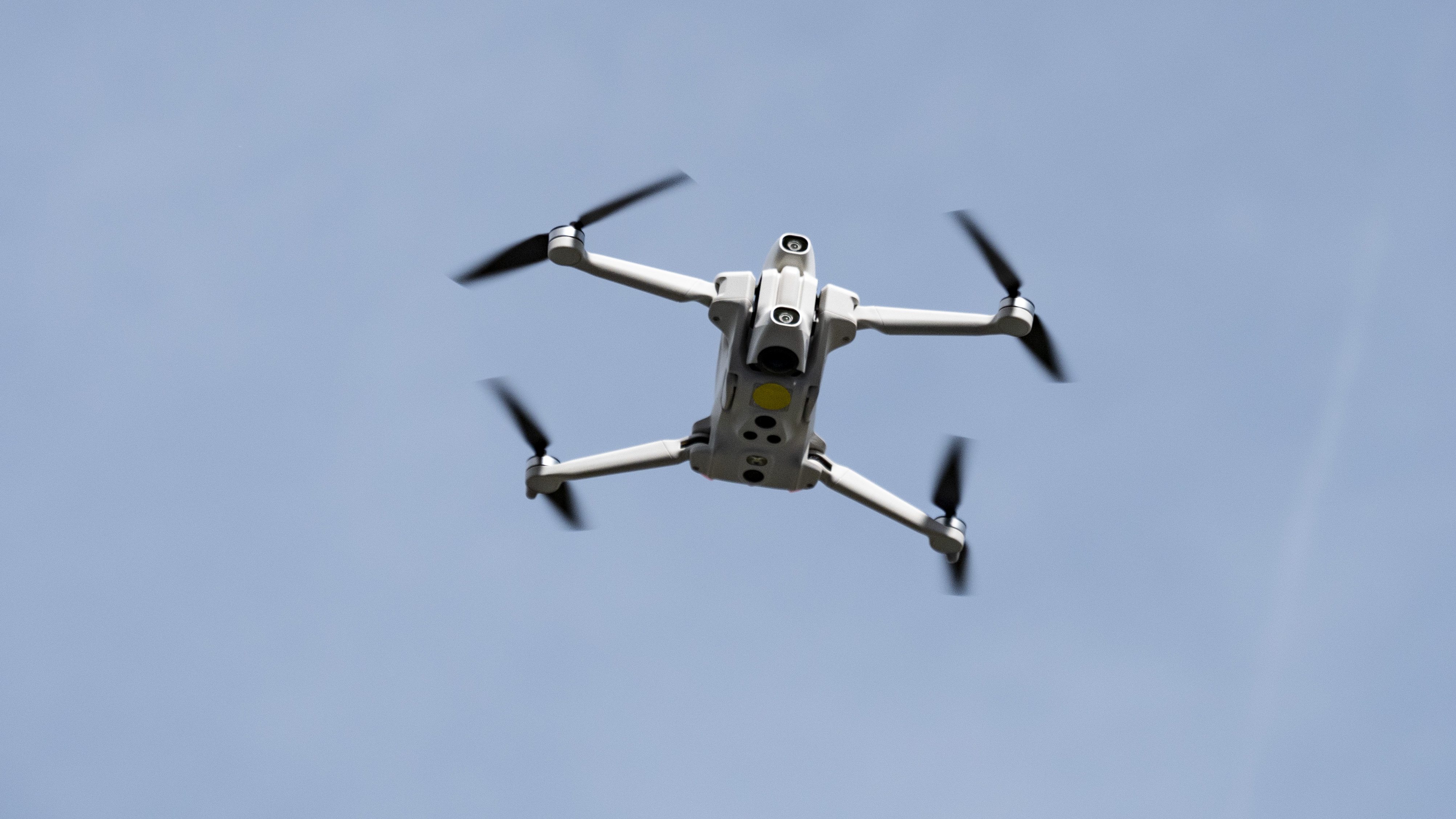 Antigravity A1 drone by Insta360, in flight, blue skies