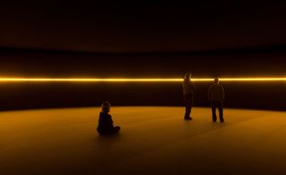 'Contact', the namesake piece in Olafur Eliasson's new show at the Fondation Louis Vuitton, uses an inclined floor, mirrors and a horizontal amber light to create the sensation of peering out into space from the pole of a planet.