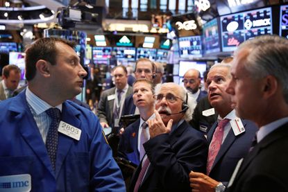 Traders on the floor of the New York Stock Exchange in August.
