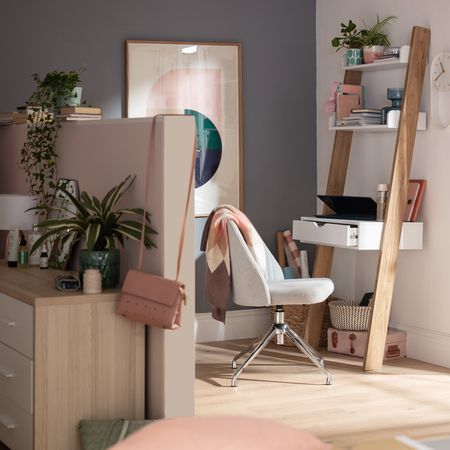 study room with ladder desk and white chair