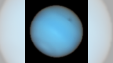 This image shows Neptune observed with the MUSE instrument at ESO&rsquo;s Very Large Telescope. A dark spot can be seen in the upper right.