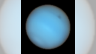 This image shows Neptune observed with the MUSE instrument at ESO’s Very Large Telescope. A dark spot can be seen in the upper right.