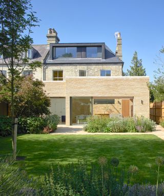 Architect Neil Dusheiko designed Sun Slice House, a large extension to a semi-detached house in Cambridge. 