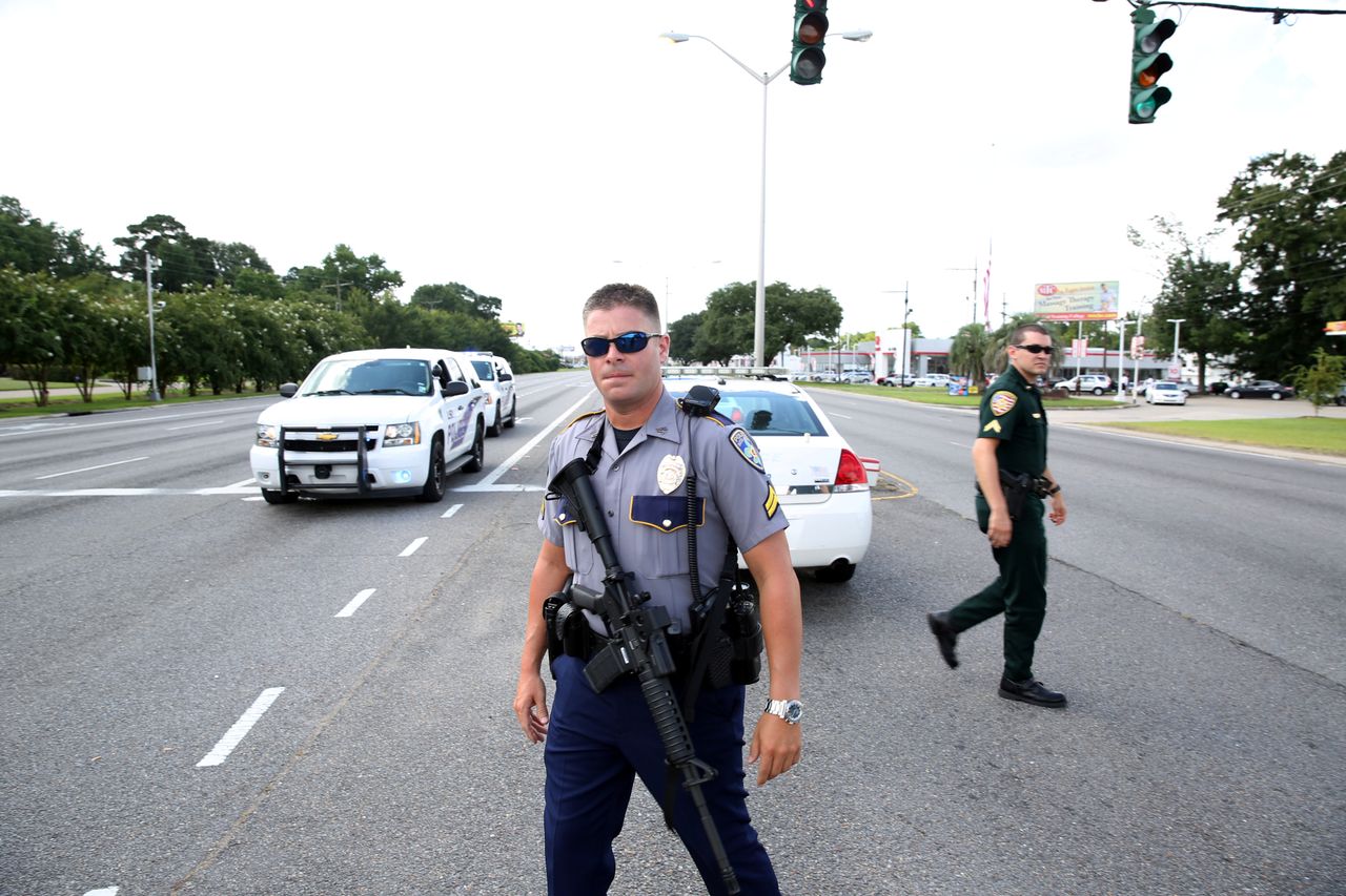 Baton Rouge police respond to a shooting attack on officers