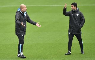 Pep Guardiola and Mikel Arteta on the Manchester City training ground