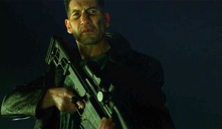 jon bernthal with large gun as The Punisher