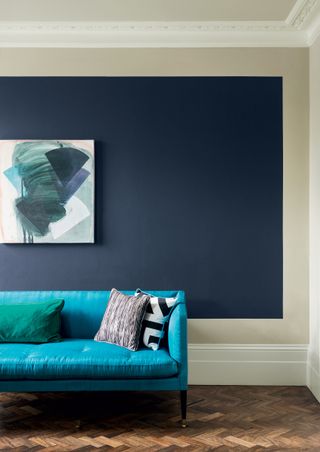 living room with navy wall
