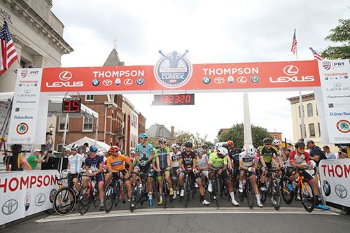 The Pro Men's Field lines up on Main Street to start their Crit.