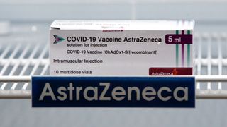 box containing the astrazeneca vaccine shown in a fridge