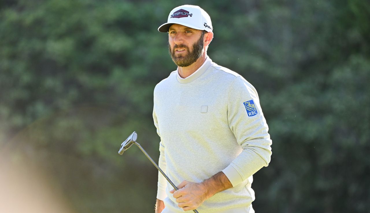 Johnson holds his putter