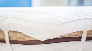 Synthetic mattress topper