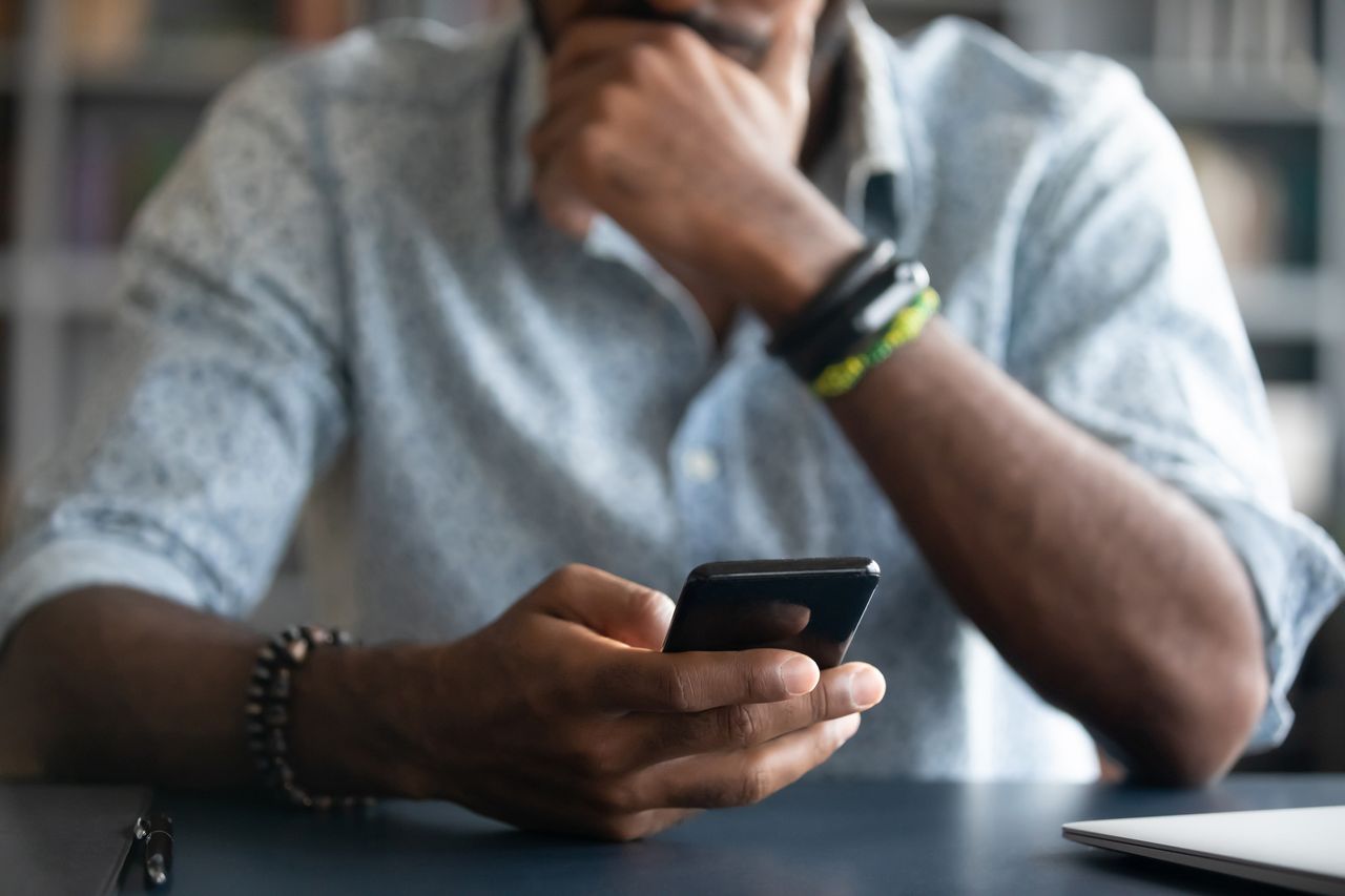 A man with a phone.