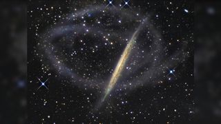 Like the Milky Way, the NGC 5907 galaxy hosts faint streams of stars that wrap all around it.