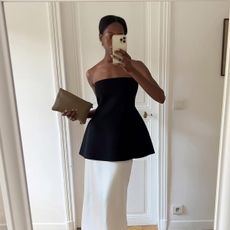 fashion influencer Sylvie Mus wearing a Rohe Wool Bustier Top with a cream maxi skirt