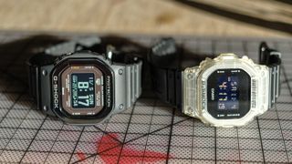Casio G-Shock Move next to a standard Casio watch.