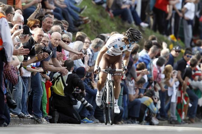 Carlos Alberto Betancur (Ag2r La Mondiale) looks back after attacking at the base of the Mur de Huy
