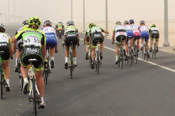 The chase group was spread across the road in the wind