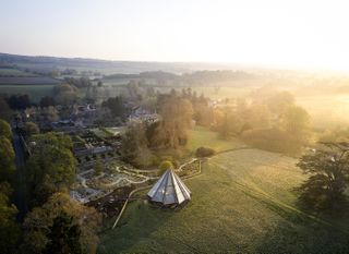 Heatherwick Glasshouse in the english countryside aerial shot