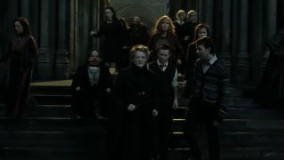 Seamus and Neville talking to McGonagall about blowing up the bridge.
