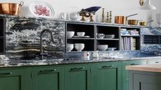 roost episode 6 - kitchen with black marble, green cabinetry and open shelving - Credit-Future_-Paul-Massey