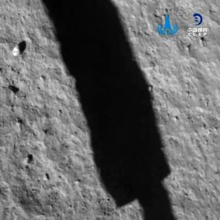 This view of the moon's surface was taken by the landing camera of Chang'e 5 shortly after its Dec. 1, 2020 touchdown in the Ocean of Storms. A shadow from one of the lander's legs is visible on the lunar surface.
