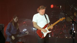 Scott Page (left) and David Gilmour perform with Pink Floyd at Wembley Stadium on August 5, 1988 in London