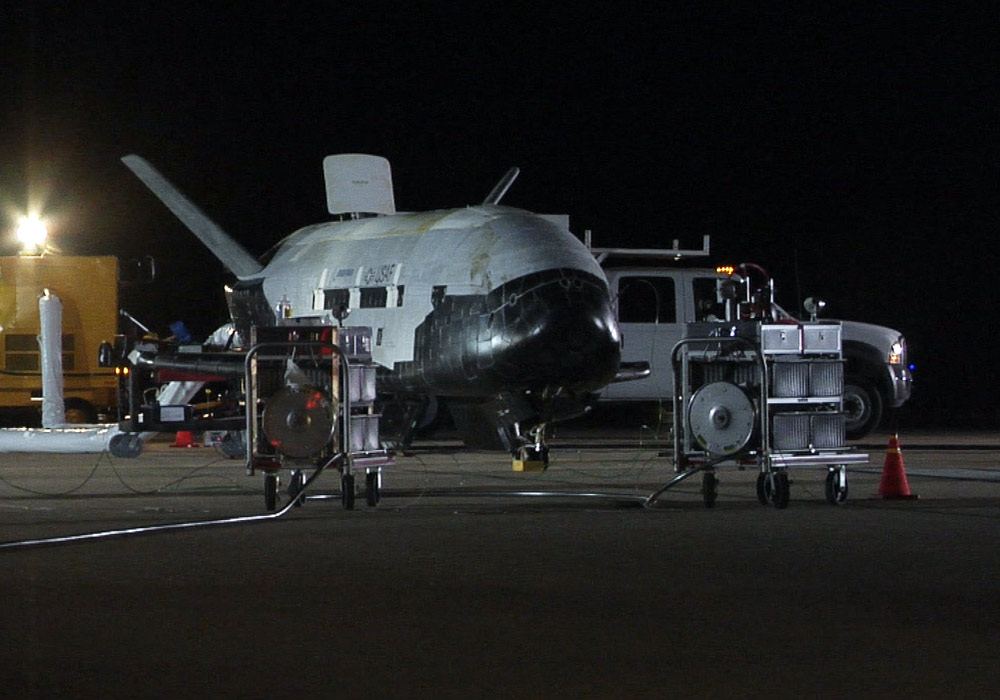 The U.S. Air Force&#039;s secretive X-37B robot space plane landed at Vandenberg Air Force Base in California on Dec. 3, 2010 to end a successful — but mysterious — seven month mission that was shrouded in secrecy. Recovery crews were quick on scene to meet th