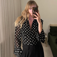 @_jeanettemadsen_ wearing a polka dot shirt