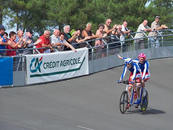Olivier Donval (stoker) and Olivier Derquene celebrating their second French title in the tandem pursuit.
