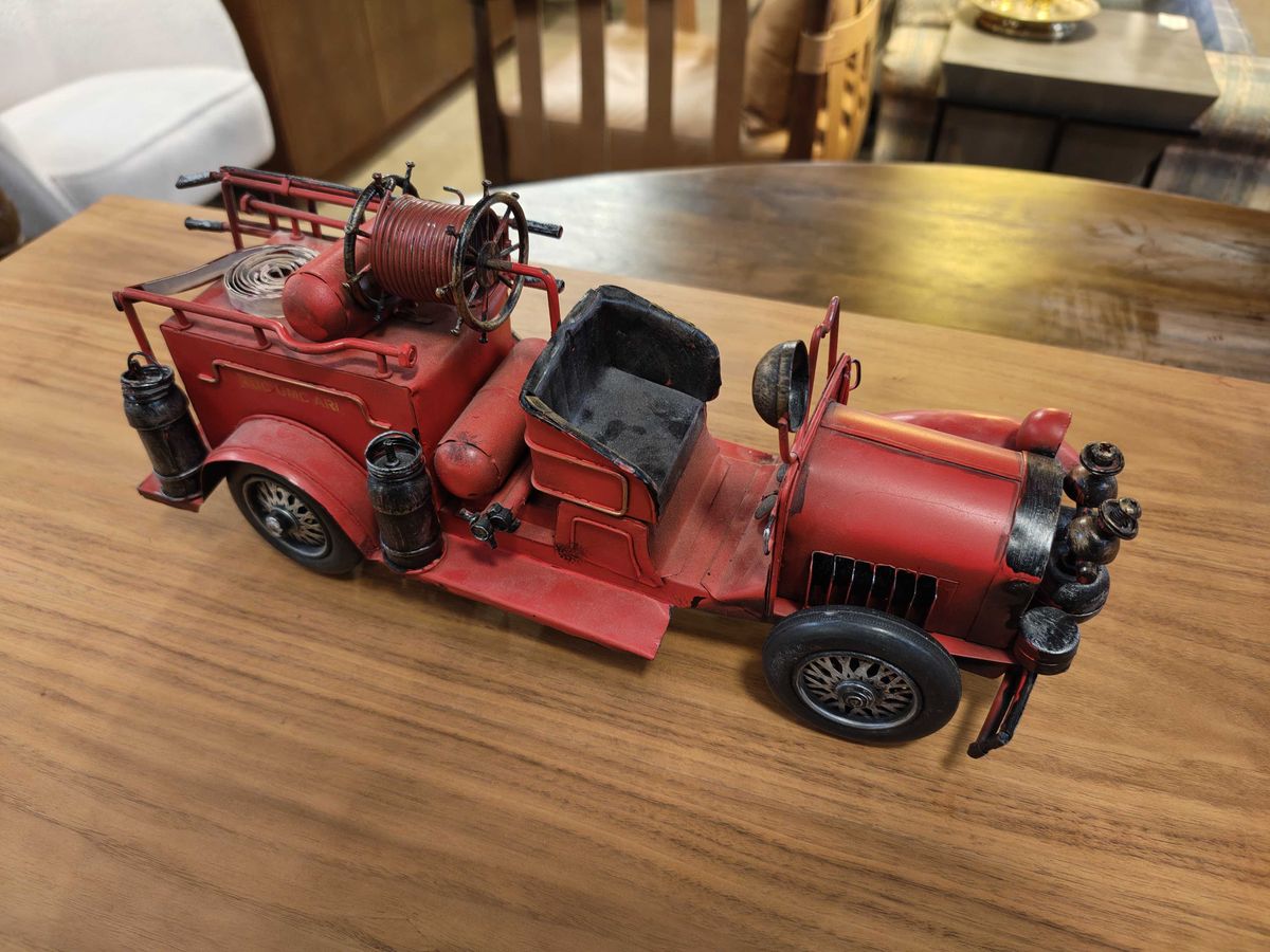An old-school red toy firetruck