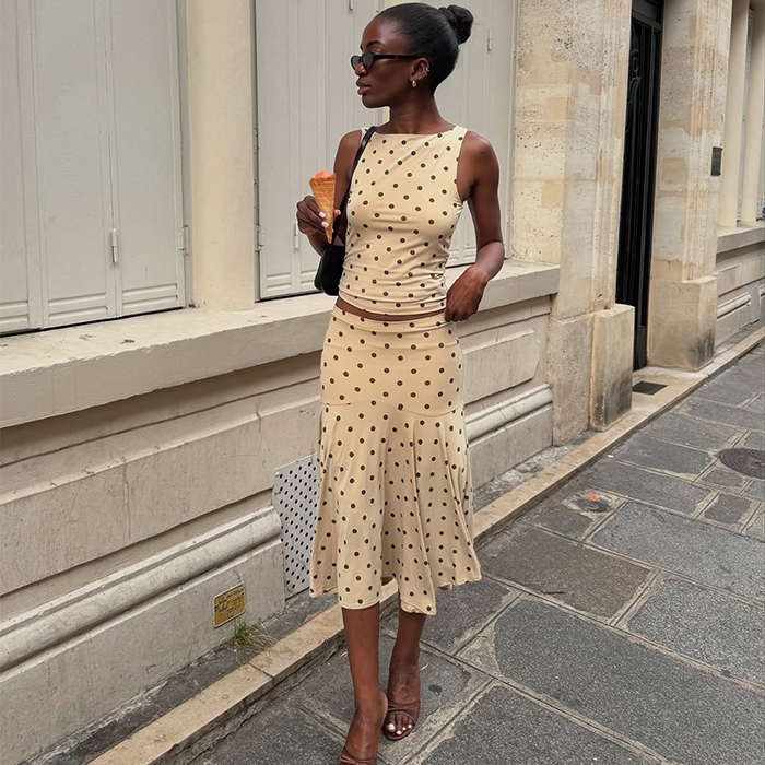 liv wears a off white polkadot skirt set 