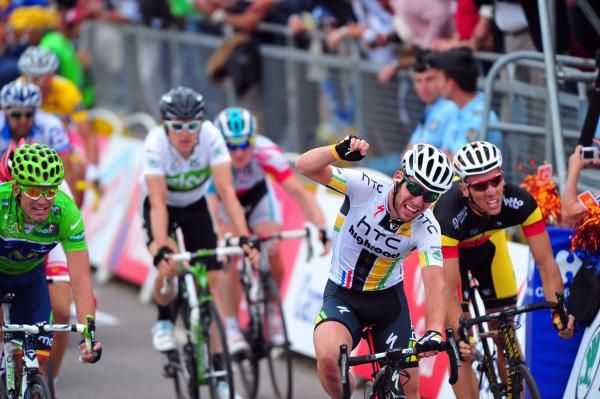 Rojas and Gilbert grimace as Cavendish celebrates