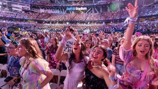 Fans enjoy Taylor Swift's performance during The Eras Tour at SoFi Stadium in Inglewood Monday, Aug. 7, 2023. (Allen J. Schaben / Los Angeles Times via Getty Images)