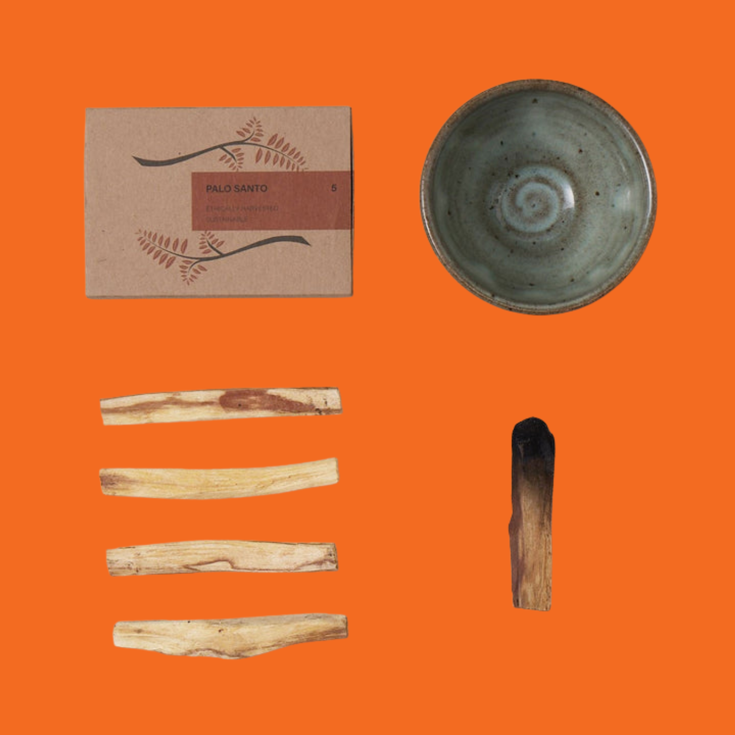A set of palo santo sticks and a blue burning bowl