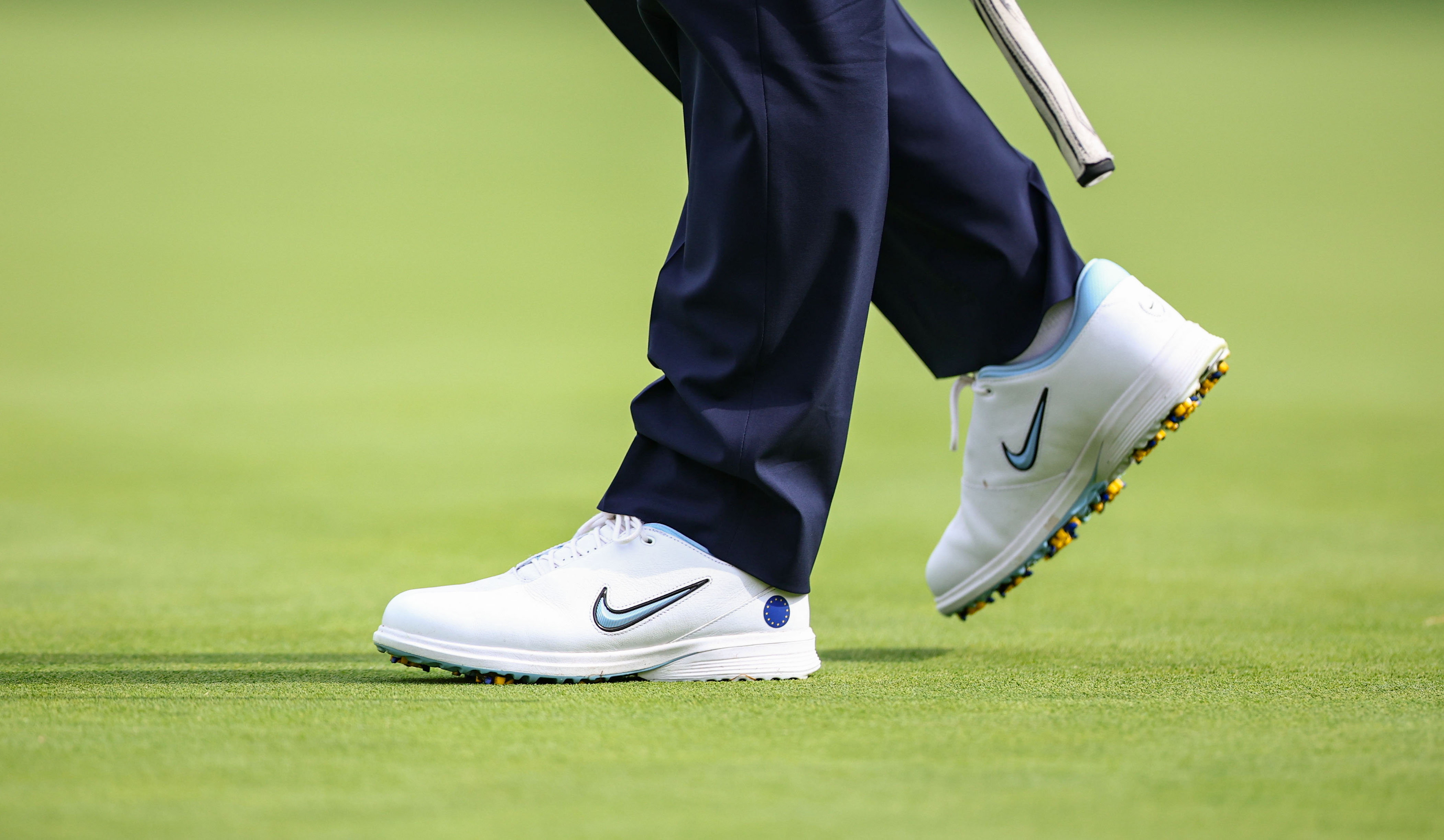 A close up of Rory McIlroy's golf shoes
