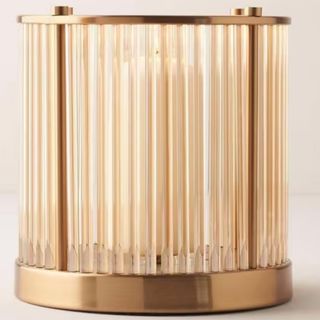 Ribbed glass and gold candle holder