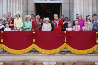 Queen Elizabeth II, Catherine, Duchess of Cambridge and Prince William, Duke of Cambridge, Meghan, Duchess of Sussex, Prince Harry, Duke of Sussex on the balcony of Buckingham Palace during Trooping The Colour