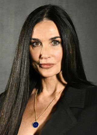 Demi Moore attends the Saint-Laurent Womenswear Fall/Winter 2022/2023 show as part of Paris Fashion Week on March 01, 2022 in Paris, France