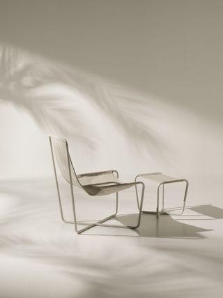 Side and back view of the garden chair by Studiopepe for Ethimo with footrest with the same design