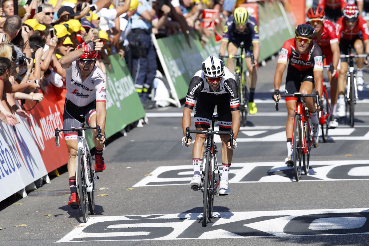 John Degenkolb gestures at Michael Matthews at the finish of stage 16