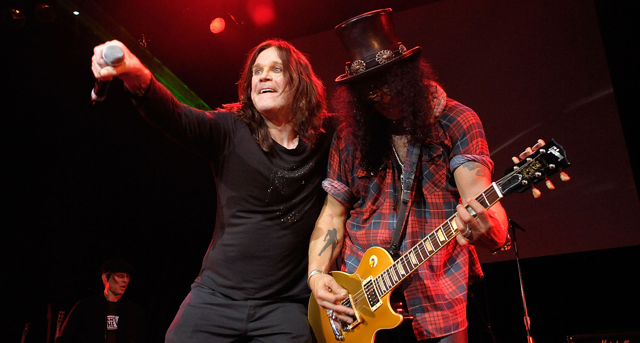 Ozzy Osbourne and Slash perform together in 2009.