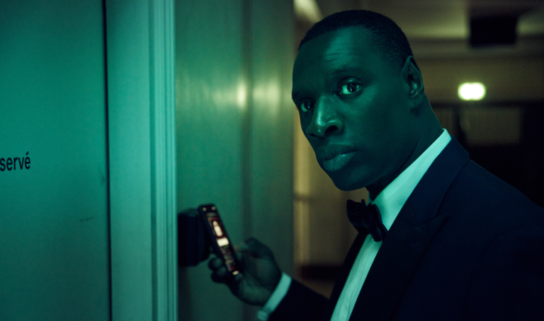 Lupin star Omar Sy dressed in a black tuxedo