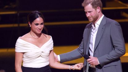 Prince Harry, Duke of Sussex and Meghan, Duchess of Sussex on stage during the Invictus Games The Hague 2020 Opening Ceremony at Zuiderpark on April 16, 2022 in The Hague, Netherlands.