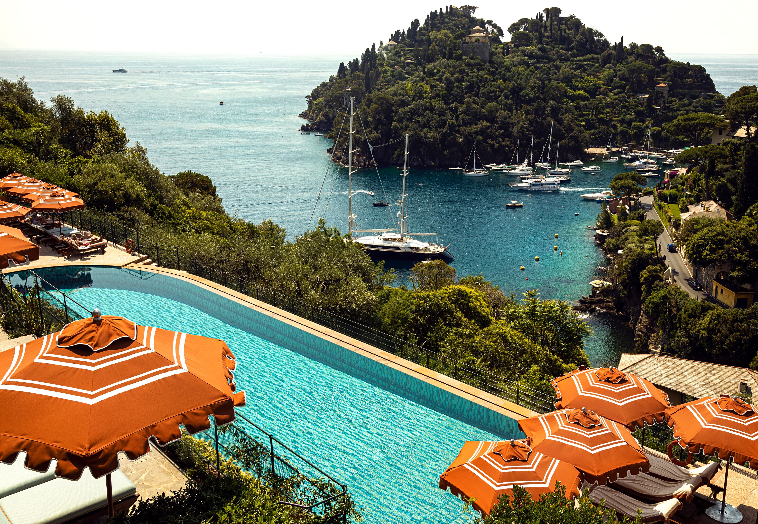 A blue salt-water pool overlooking the Bay of Portofino