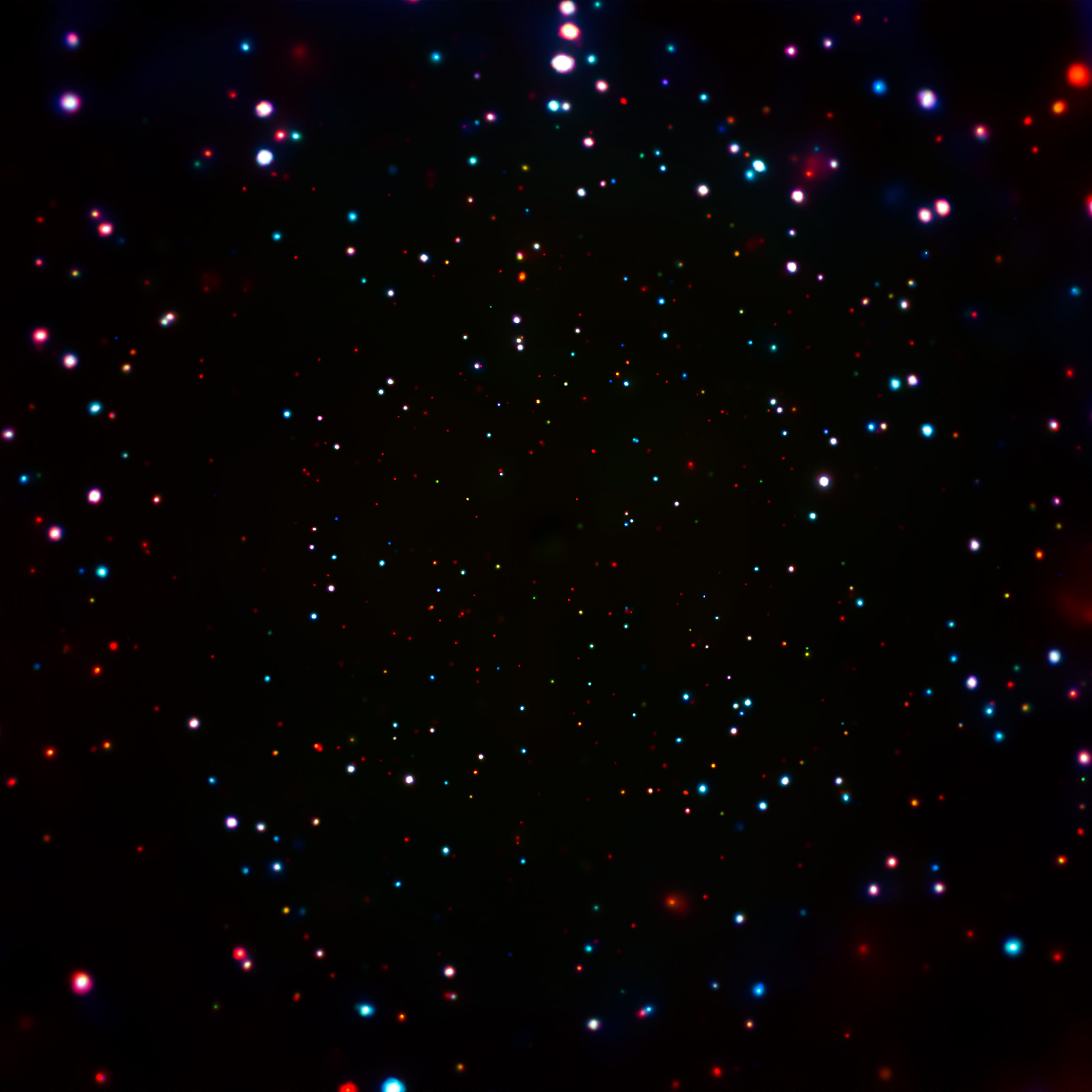 A black background with multiple blue, red, and white orbs