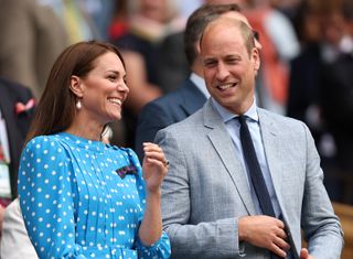 Prince William and Kate Middleton smile at Wimbledon