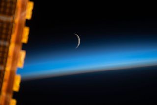 An astronaut captured this image of the crescent moon from the International Space Station while the orbiting laboratory was above the Sea of Japan.
