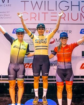 Women's podium at 2022 Rochester Twilight Criteriuim (L to R): runner-up Colleen Gulick, winner Mariana Valadez, third-placed Andrea Cyr