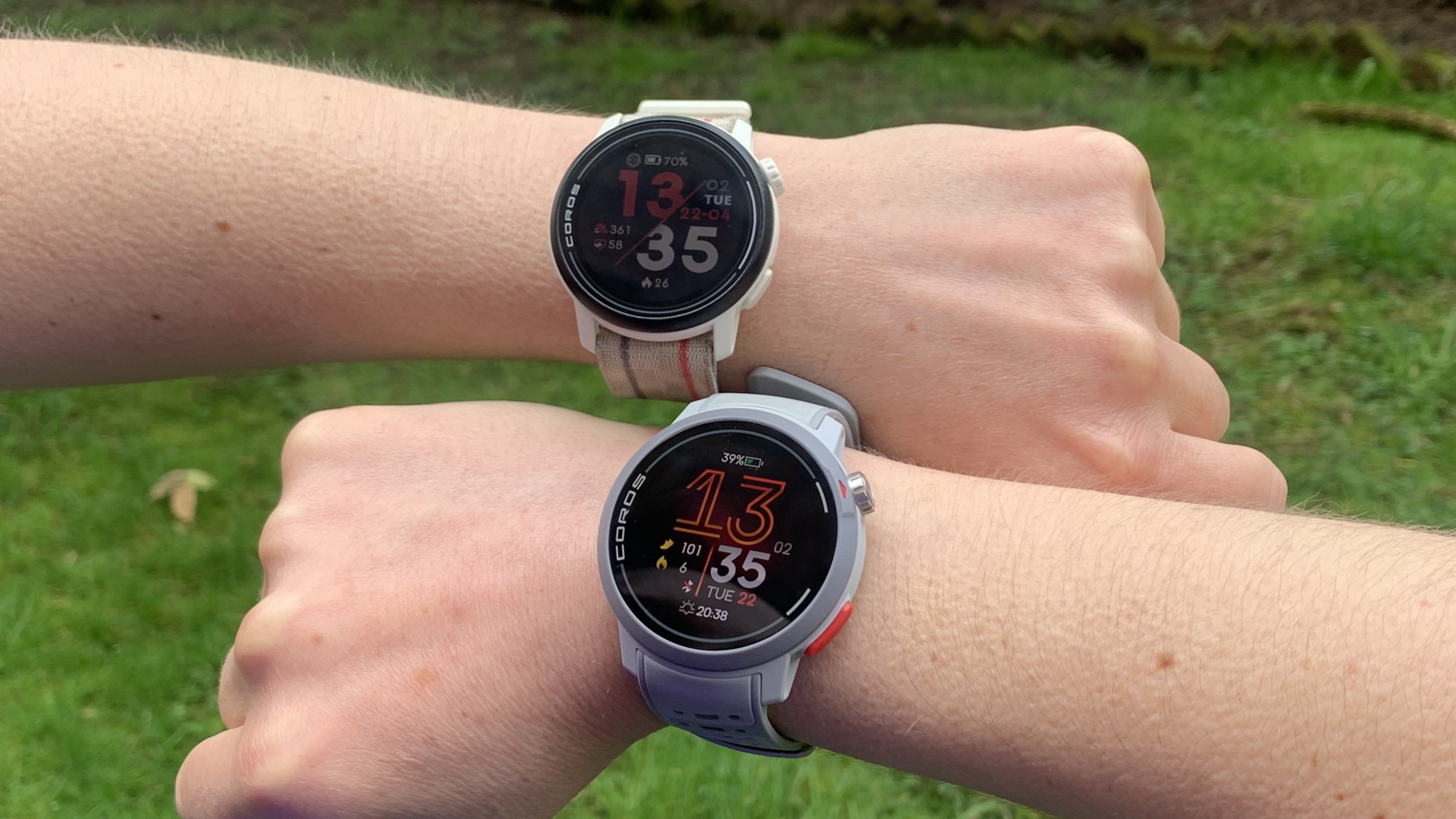 A runner's wrists wearing the Coros Pace Pro and Coros Pace 3